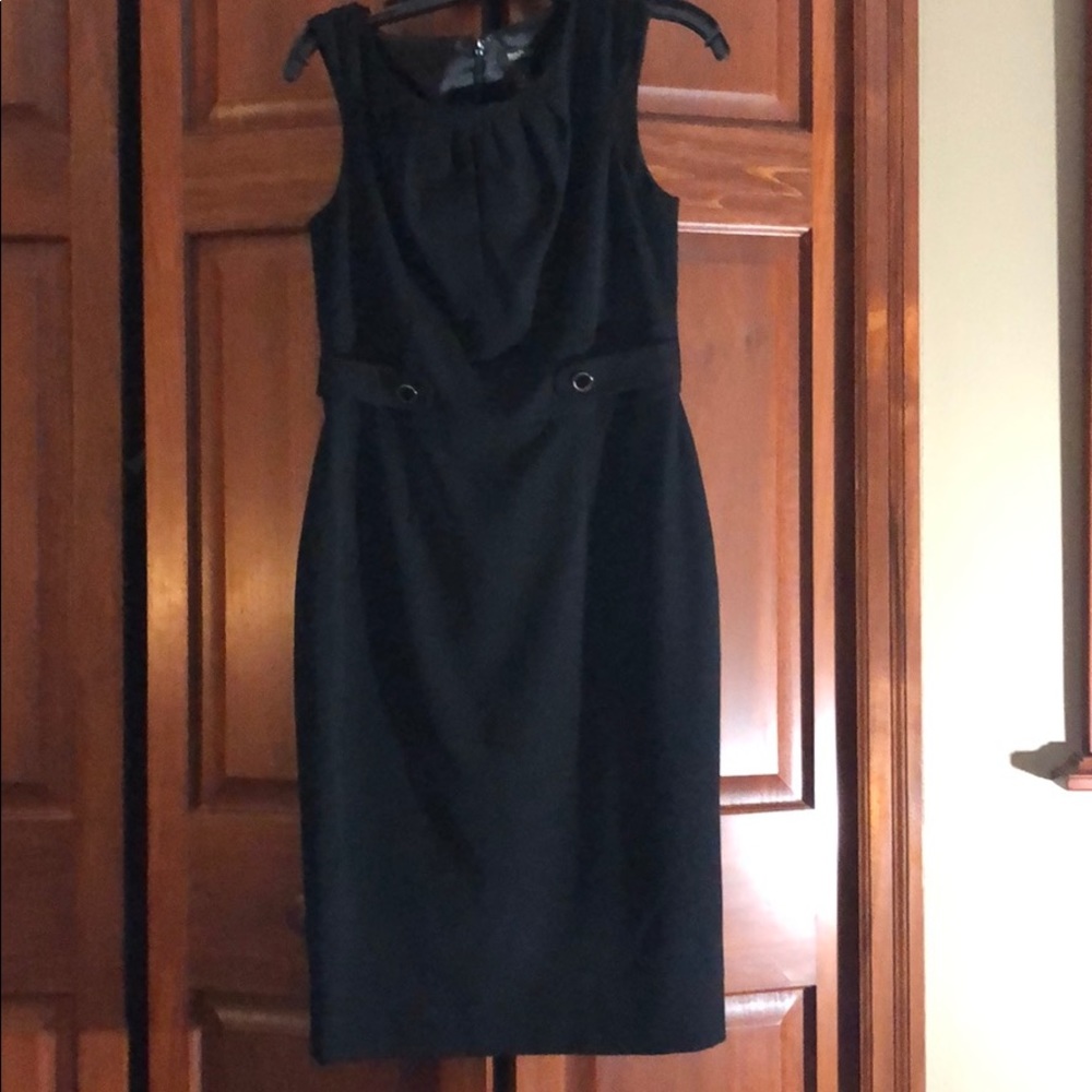 Cute sheath dress w/button detail.
